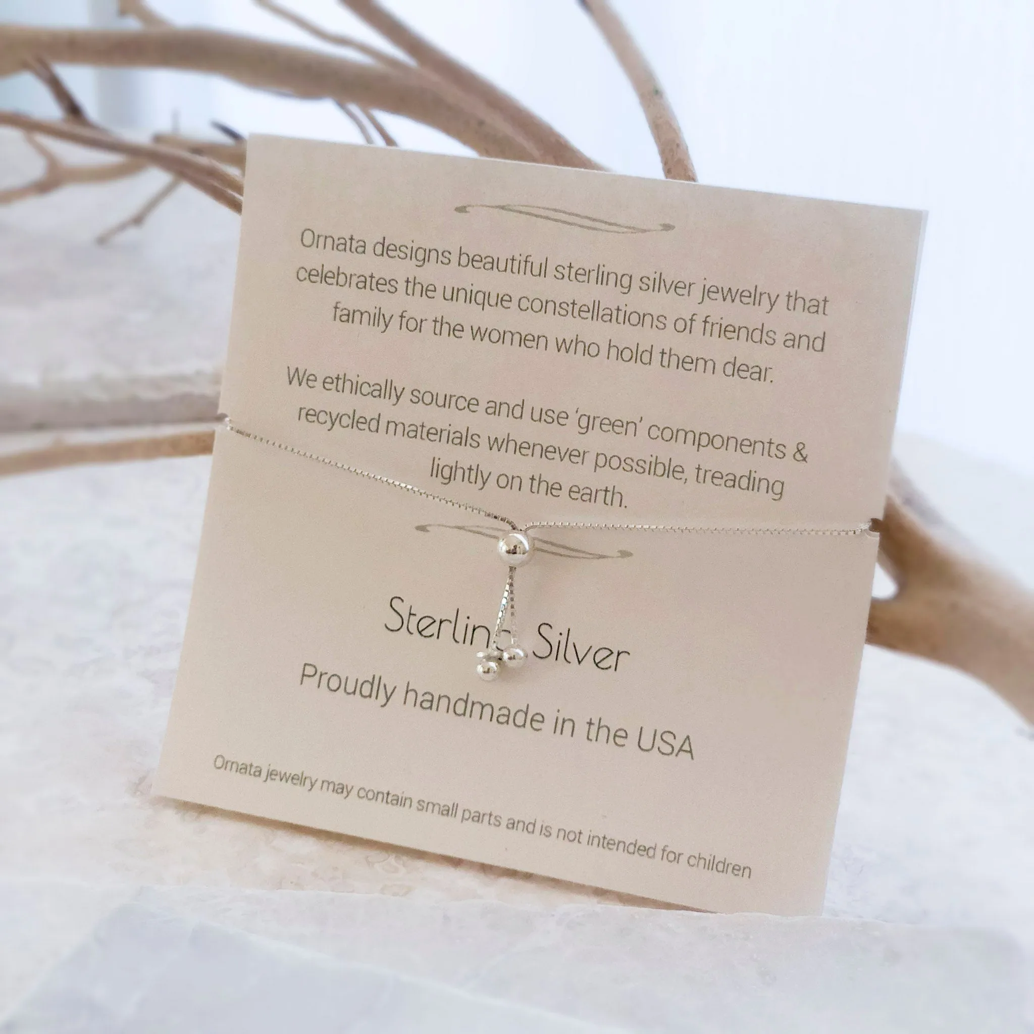 “Family of Four” Sterling Silver Bolo Bracelet on Personalized Jewelry Card