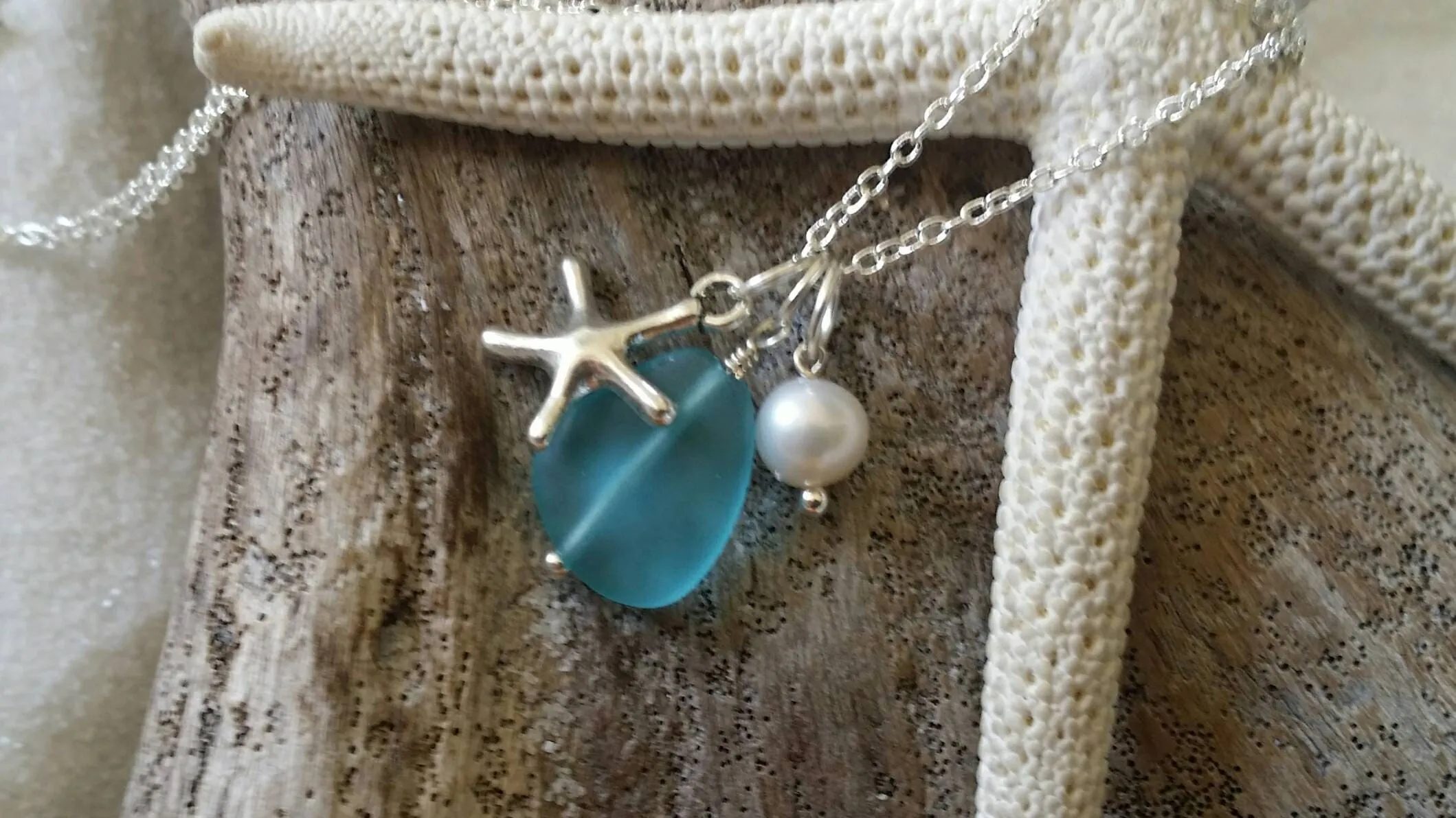 Handmade in Hawaii, Blue blue sea glass beach glass necklace,Sea start  charm, Fresh water pearl, . Beach jewelry.